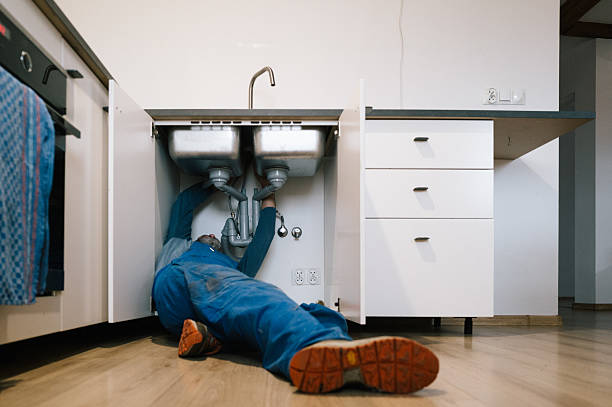 Professional Plumbing technician working in Farmingdale, NY